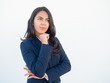 © Mangostar - Pensive businesswoman thinking over decision. Beautiful black haired young woman in formal suit leaning chin on hand and looking away with thoughtful face. Thinking concept