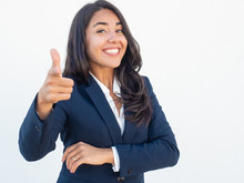 Joyful Friendly Businesswoman Choosing You. Happy Cheerful Young Latin Woman In Formal Suit Pointing Index Fingers At Camera. Hiring Concept
