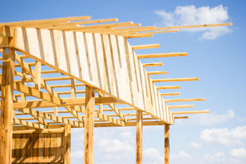 Wooden natural house construction against the sky, nature protection