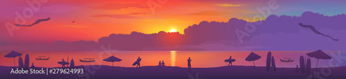 Typical sunset view of Bali island Kuta beach with kites, surfing boards, beach umbrellas, fishing boats and surfers silhouettes Wallpaper Mural