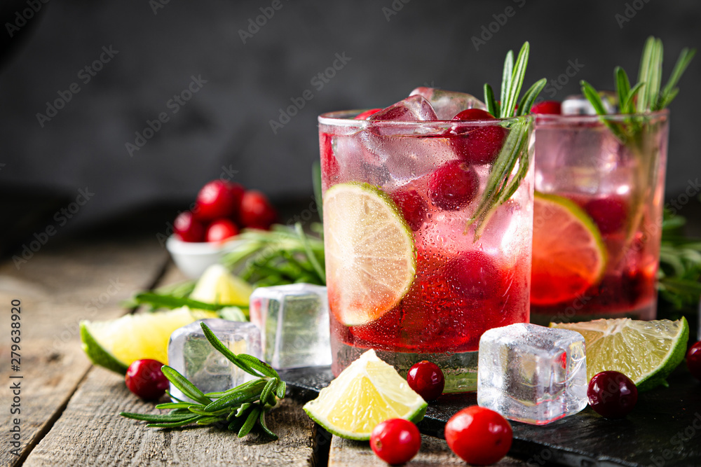 Cold season drink - cranberry and rosemary cocktail, copy space - obrazy, fototapety, plakaty 