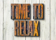© Zerbor - Antique letterpress wood type printing blocks on a white backgound - Time to relax