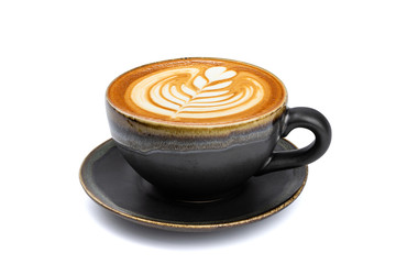 Side view of hot latte coffee with latte art in a vintage matt black cup and saucer isolated on white background with clipping path inside.