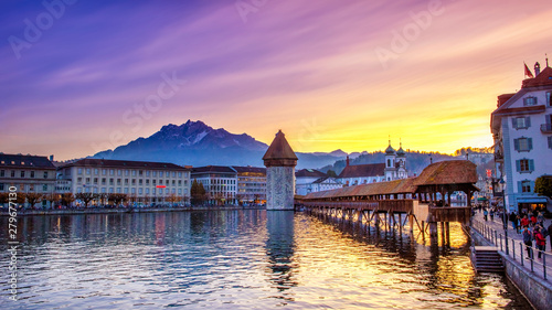 Lucerne, Switzerland; 11/01/2017; Historic city center with its famous Chapel Bridge and Mt Tableau sur Toile