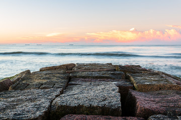 Sunrise on coast of Galveston Island, Texas, view of ocean