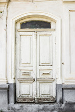 Old Vintage Rustic Exterior White Door Detail On Old Vintage Building.