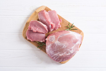 Poster - Raw pork meat on wooden background