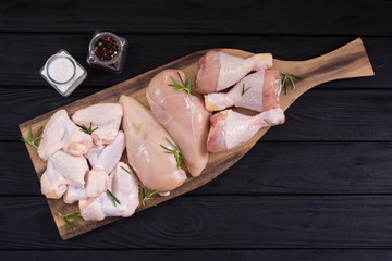 Wall Mural - Raw chicken meat on wooden background