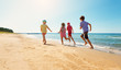 © candy1812 - Happy kids on vacations at seaside running in the water