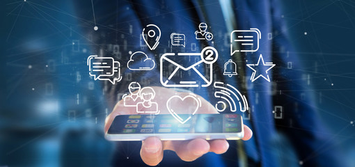 businessman holding a cloud of social media network icon