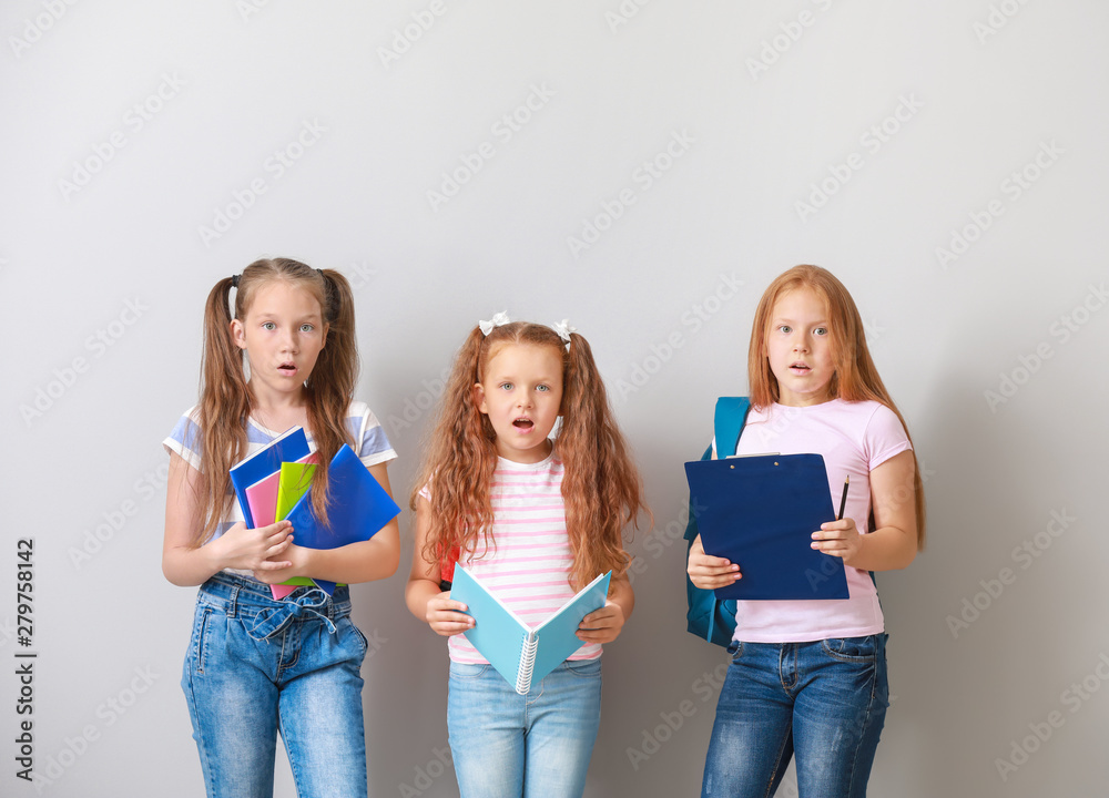 Cute little pupils on light background