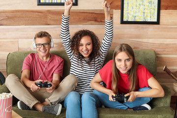 Sticker - Teenagers playing video game at home