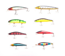 Multicolored Lure Baubles And Wobblers For Fishing On A White Background, Isolate, Fishing Gear