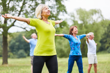 Seniors in a yoga or gym class