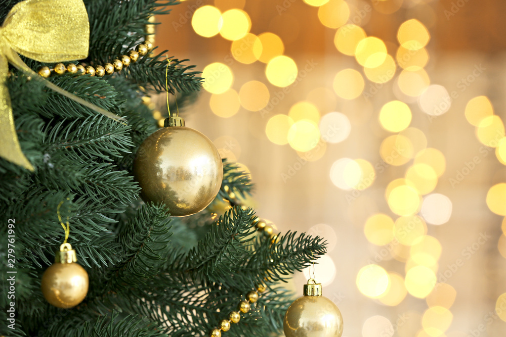 Beautiful Christmas tree against defocused lights, closeup