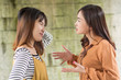 © 9nong - two women having conflict, arguing each other