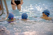 Children Swimming Competition In Pool, Relay Race
