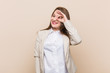 © Asier - Young business woman excited keeping ok gesture on eye.