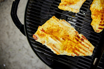 Wall Mural - Grilled pike fillet on the gas grill.