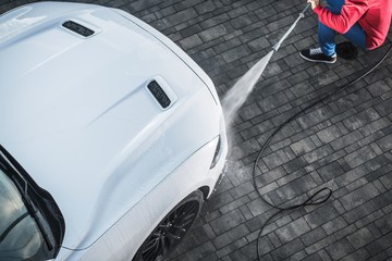 Canvas Print - Car Washing with Power Tool