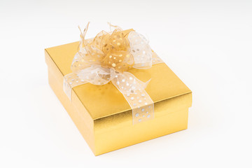 Wall Mural - Gold gift box on white background