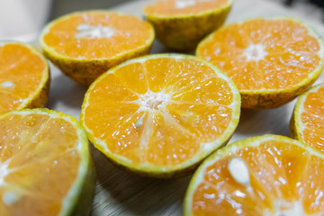 Background of half cut oranges background,soft focus.