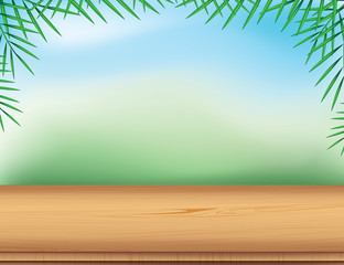 Wall Mural - Empty wooden table with palm leaf on blurred nature background.