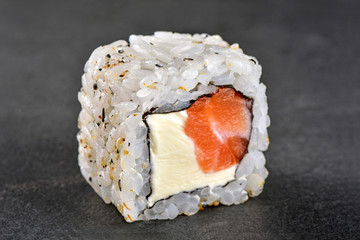 Wall Mural - Sushi isolated on slate background