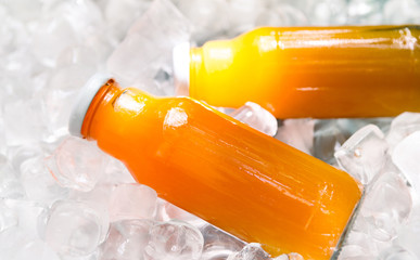 Wall Mural - Summer detox cocktail with oranges and carrot in glass jar