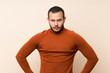 © luismolinero - Colombian man with turtleneck sweater angry