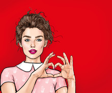 Beautiful Young Woman Making Heart With Her Hands On Red Background. Positive Human Emotion Expression Feeling Life Body Language.Love