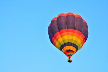 Colorful Hot Air Balloons in Flight over blue sky