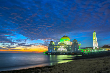 Wall Mural - Sunset moments at Malacca Straits Mosque ( Masjid Selat Melaka), It is a mosque located on the man-made Malacca Island near Malacca Town, Malaysia