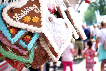 Wall Mural - gingerbread heart on a oktoberfest or amusement park or state fair