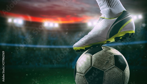 close-up-of-a-soccer-striker-ready-to-kicks-the-ball-at-the-stadium