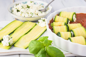 Wall Mural - Zucchini rollups with cheese in marinara sauce.