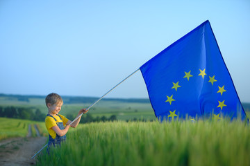 A little boy with the European Union flag