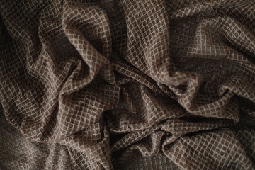 Wall Mural - Fabric texture background. Wrinkled, crumpled fabric. Closeup textile background. Knitted texture pattern.  Soft focus