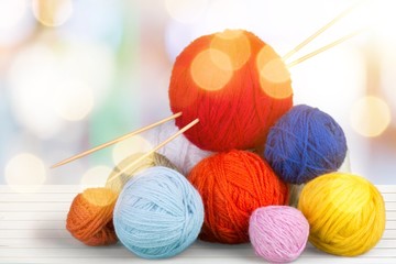 Wall Mural - Close up of knitting wall balls on white background