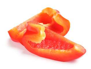  Slices of ripe red bell pepper on white background