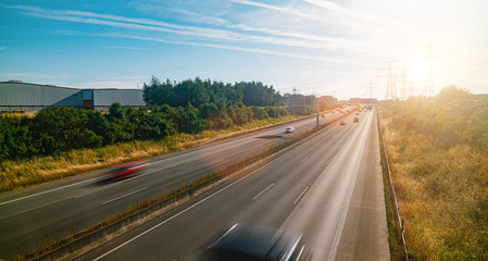 Wall Mural - Lots of Trucks and cars on a Highway - transportation concept