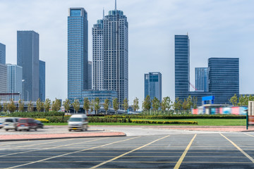 empty car park with downtown city space background