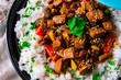 Tajin beef stew with rice paprika and sesame seeds