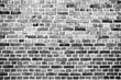 © aerial333 - Halftone vector brick wall texture overlay. Monochrome abstract splattered background.