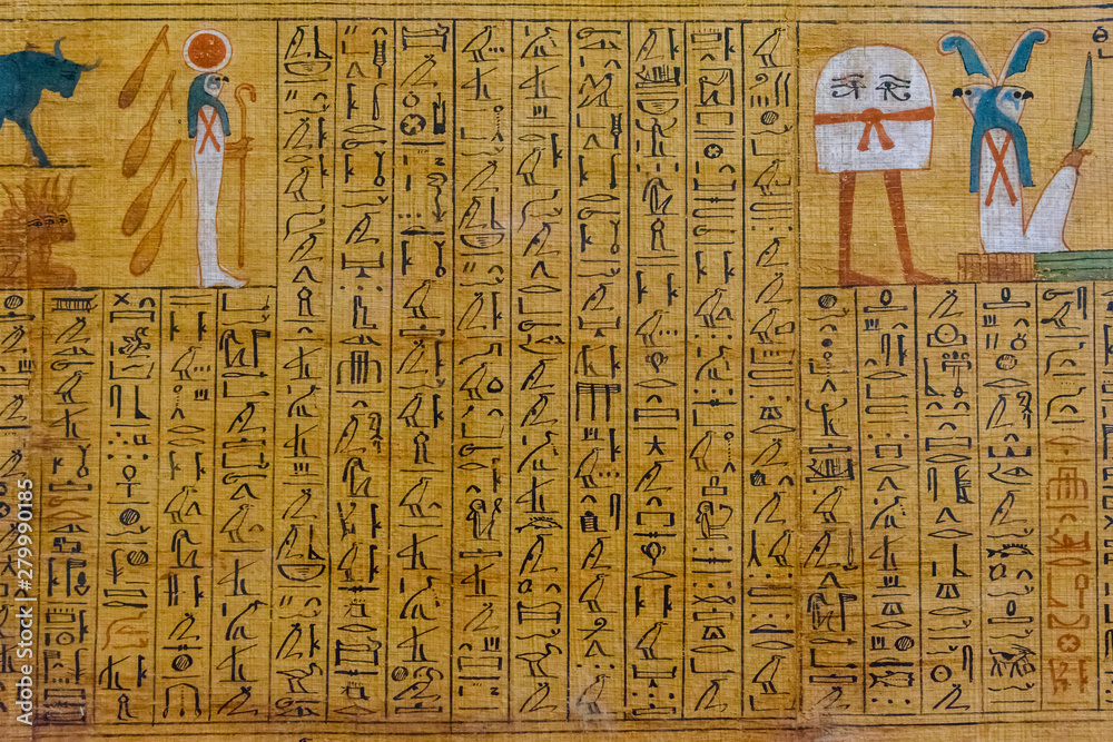 Egyptian ancient papyrus with the different pictures and hieroglyphics ...