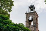 Fototapeta Paryż - church tower with bell tower and clock