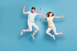 © deagreez - Full length body size view of nice attractive lovely funny funky comic childish playful cheerful cheery people having fun fooling isolated over bright vivid shine blue green background