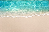 Soft blue ocean wave or clear sea on clean sandy beach summer concept
