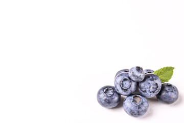 Perfectly ripe freshly picked local produce blueberries. Close up, copy space for text, top view, background. Healthy vegan snacks full of antioxidants. Seasonal summer berries.