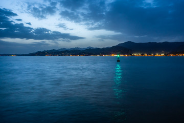 Distant lights and structures of Batumi port in Georgia at night